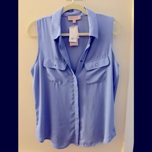 Light blue sleeveless blouse